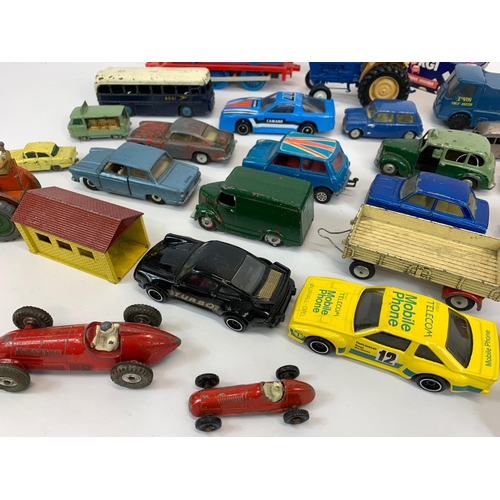 54 - A collection of model cars and trucks. Dinky, Corgi, Lesney.