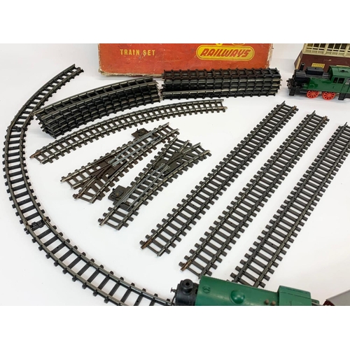 56 - A vintage Triang (Tri-ang) Railways Train Set in original box. Including 2 trains, 3 carts, tracks e... 