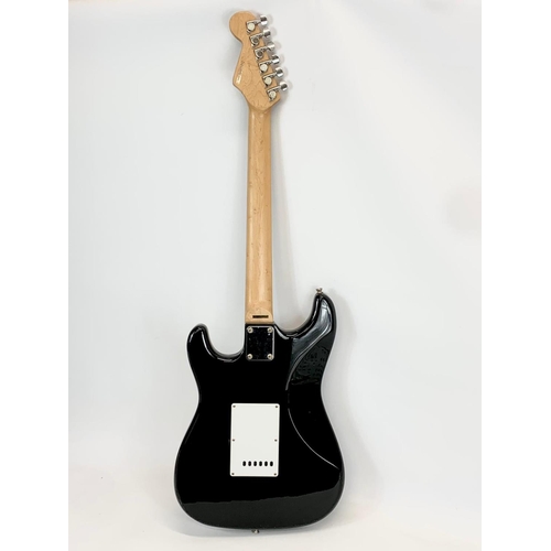 68 - An electric guitar by Fender. Squier Strat. 99cm