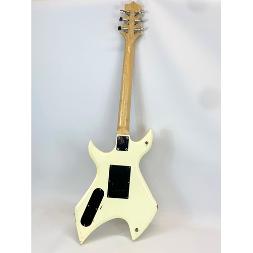 69 - An electric guitar by Wesley. 104cm