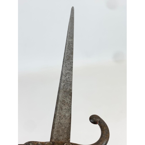 79 - A late 19th century French bayonet. 1880. 64cm