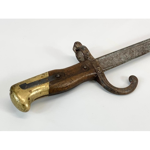 79 - A late 19th century French bayonet. 1880. 64cm