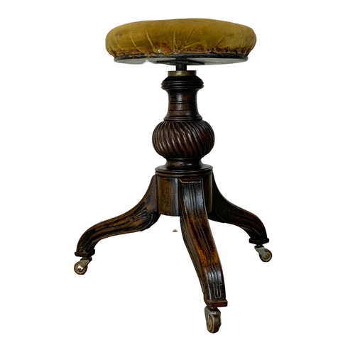 1090 - A Victorian mahogany piano stool, in the George IV style.