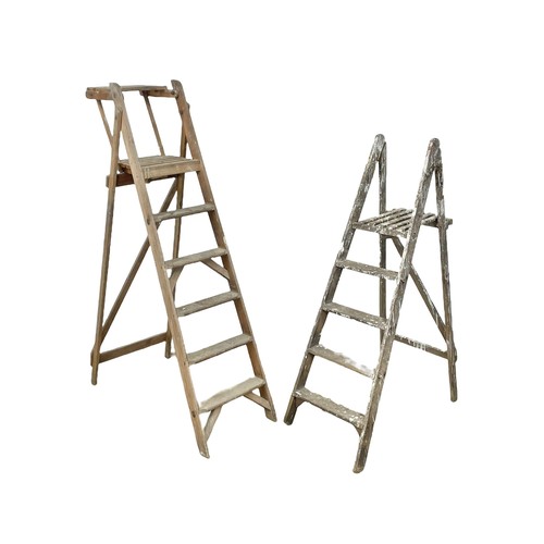 371 - 2 vintage wooden stepladders.