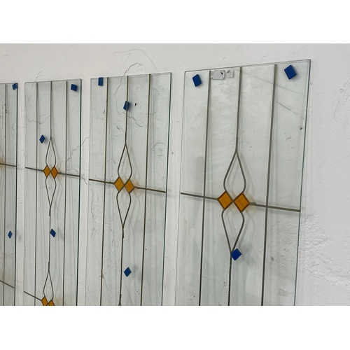 376 - 5 glass panels. 32 x 106.5cm