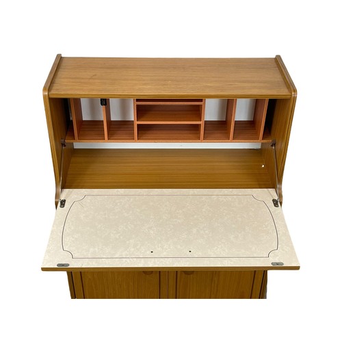 1087 - A Stateroom Mid Century teak writing bureau. 78.5  x 34.5 x 107.5cm