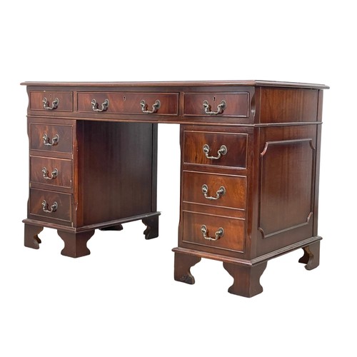 1088 - A Georgian style inlaid mahogany pedestal writing desk. 124 x 62 x 77.5cm