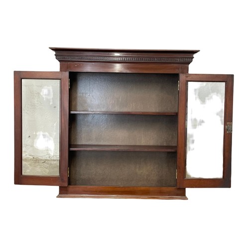 1089 - A late Victorian mahogany wall hanging bookcase. 101.5 x 32 x 104cm