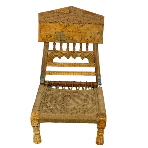 1094 - An Afghan folding chair.