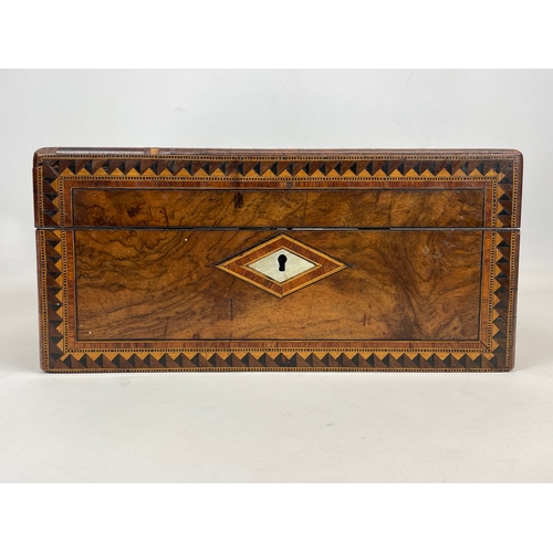 1 - A Victorian walnut inlaid jewellery box, with mother of pearl.