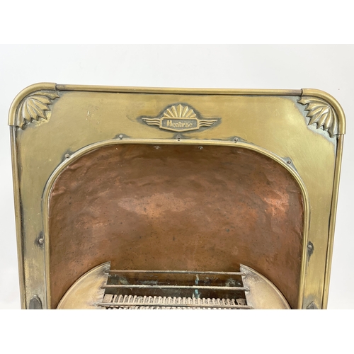 21 - A vintage Heatrae brass and copper fire inset. 51 x 22 x 53cm