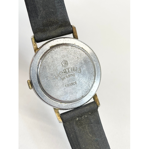 592 - A vintage gents Mortima De Luxe watch.