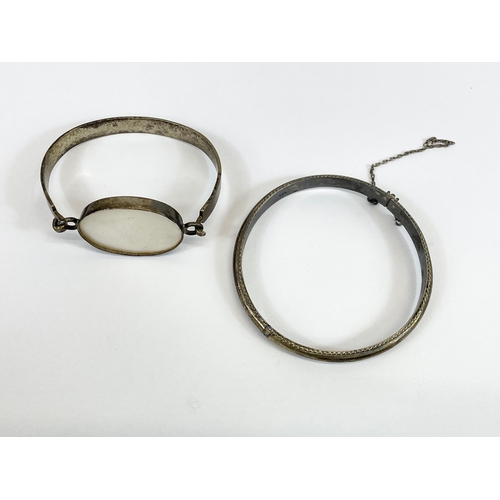 593 - 2 vintage silver bangles.