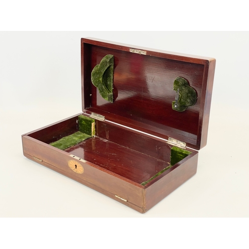 34 - A vintage inlaid mahogany box. 39.5 c 21.5 x 9.5cm