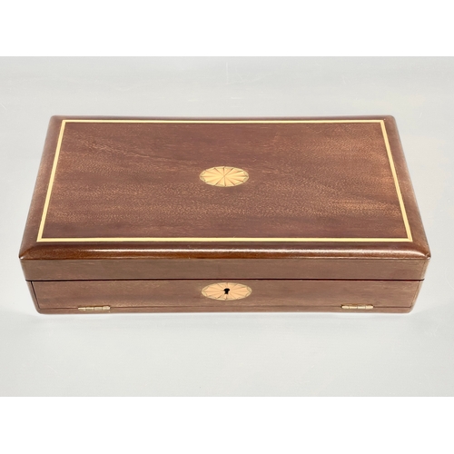 34 - A vintage inlaid mahogany box. 39.5 c 21.5 x 9.5cm