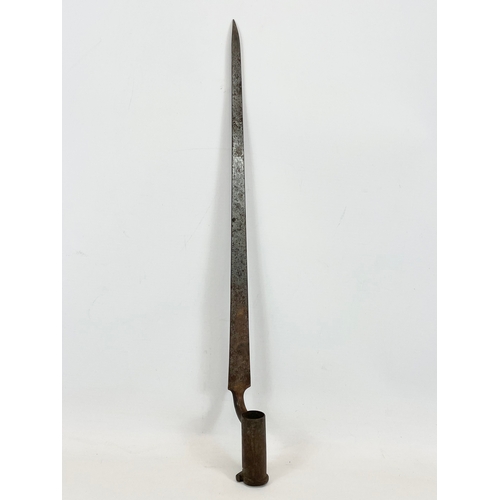 35 - A late 18th / early 19th century British socket bayonet. 53cm