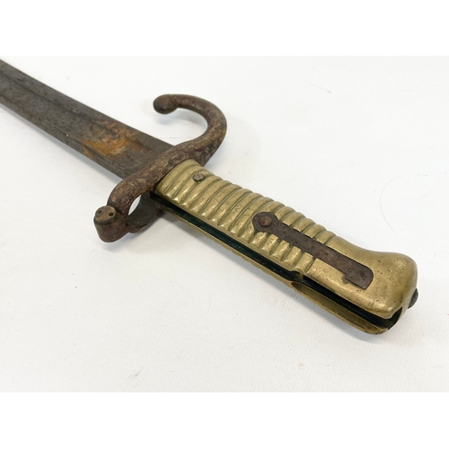 38 - A 19th century French sword bayonet. 70cm