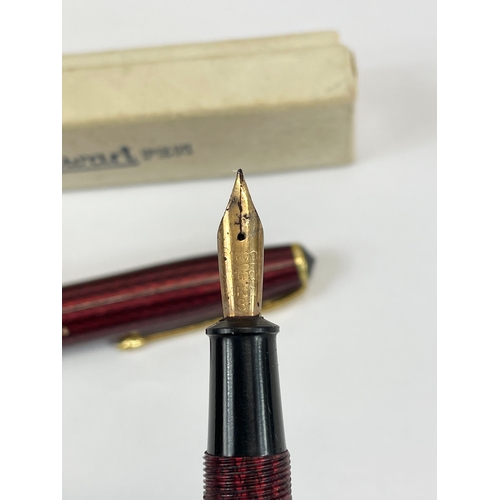 539 - A 14ct gold nib fountain pen, by Conway Stewart, in box.