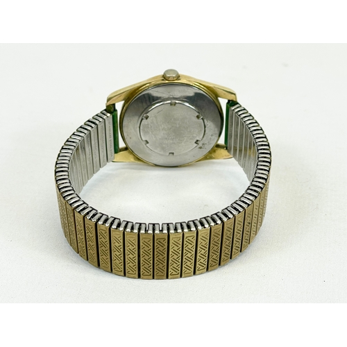 546 - A vintage Audax Aquaprufe gold plated watch.