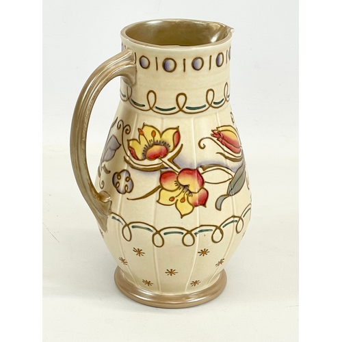 422 - A Charlotte Rhead jug designed for Bursley Ware. 653. 1930’s. 22cm