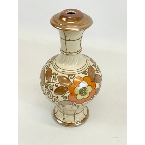 423 - A Charlotte Rhead lamp. Trellis Pattern. 25cm