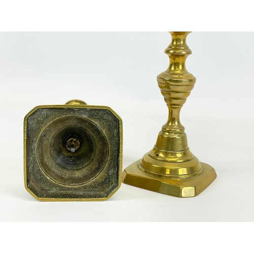 429 - A pair of Victorian brass candlesticks. 22cm