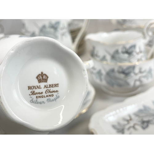 437 - A 55 piece Royal Albert “Silver Maple” coffee set.