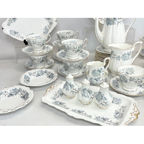 437 - A 55 piece Royal Albert “Silver Maple” coffee set.