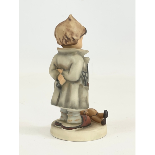 439 - An M. J Hummel Goebel pottery figure “Doctor” 127. 12.5cm