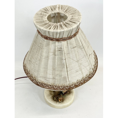 440 - An M. J. Hummel Goebel pottery figure lamp “Just Resting” 225. Base measures 16 x 29cm without shade... 