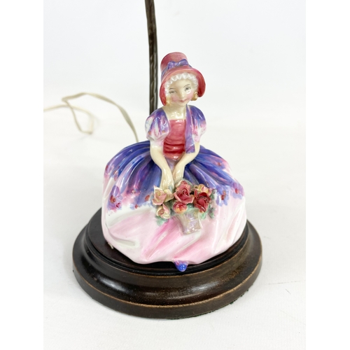 443 - A Royal Doulton pottery figure lamp. 36cm including shade.