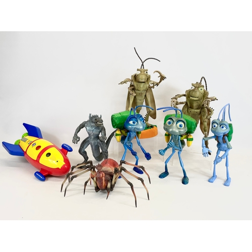 66 - A collection of large toys. 4 Disney Pixar Bugs Life toys, Godzilla, Doctor Who etc. 35cm