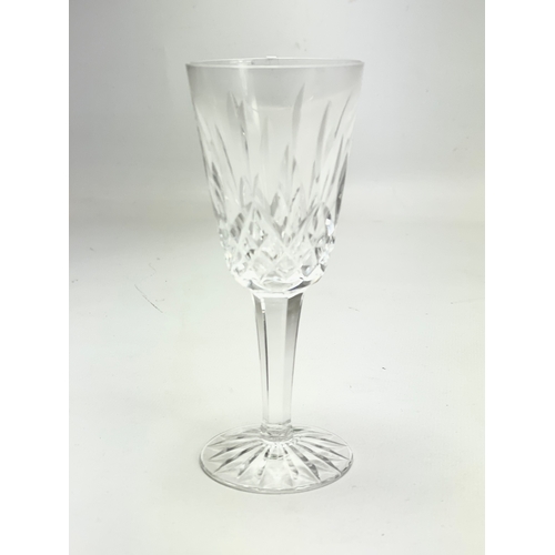 450 - A set of 6 Waterford Crystal “Lismore” pattern sherry glasses. 13cm