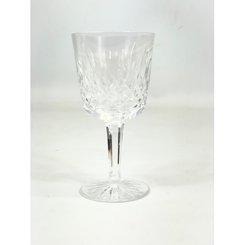 454 - A set of 4 Waterford Crystal “Lismore” pattern sherry glasses. 11cm