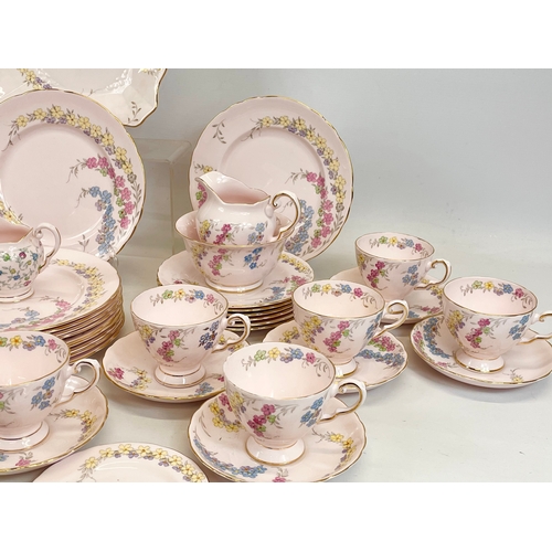 457 - A 56 piece Tuscan tea set. 12 salad plates 21.5cm, 12 sandwich plates, cake plate, 2 milk jugs, 2 su... 