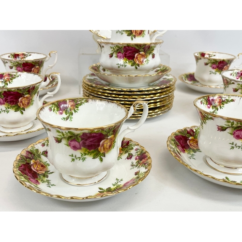 459 - A 26 piece Royal Albert Old Country Roses tea set. 10 sandwich plates, 6 cups, 7 saucers, milk jug, ... 