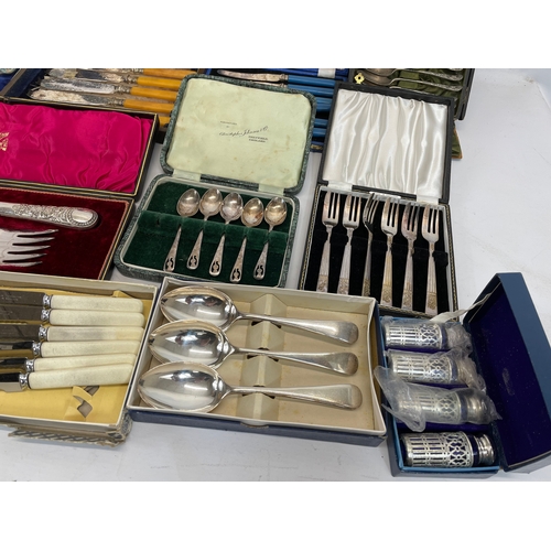 470 - A large quantity of 19th and 20th century silver plated cutlery etc. Some stainless.