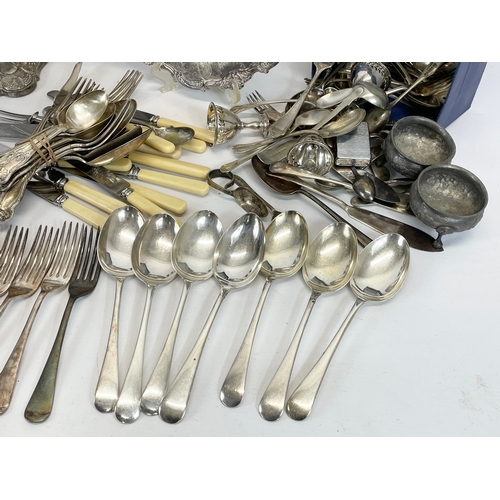 471 - A quantity of good quality silver plated cutlery and other silver plate. Some stainless.