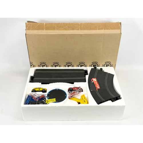 67 - A Scalextric racing set.