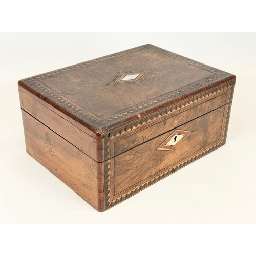 1 - A Victorian walnut inlaid jewellery box, with mother of pearl.