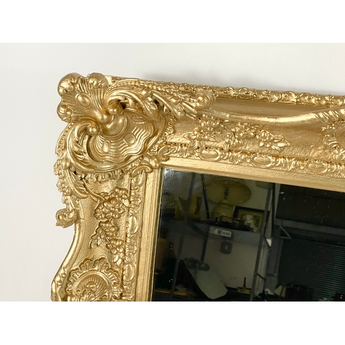 45 - A Victorian ornate gilt framed mirror. Repainted. 77 x 13 x 63cm