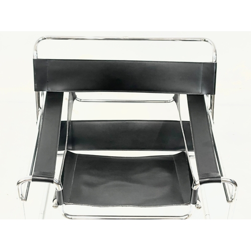 836 - A Wassily style leather and chrome armchair.