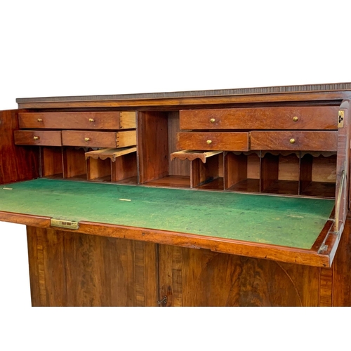 865 - An Irish George III inlaid mahogany secretaire chest, with 2 door cupboard. Georgian. Circa 1800. 11... 