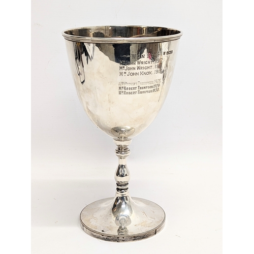 552 - A large silver cup inscribed North Down Agricultural Society 1911. Sheffield, 584 grams.