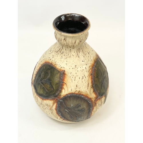 473 - A West German Mid Century pottery vase. 610/17. 18cm