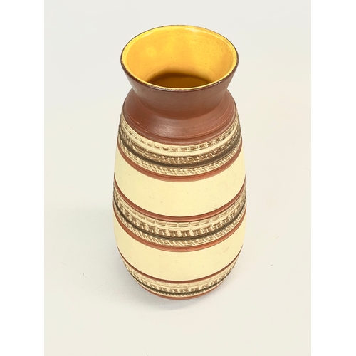 474 - A West German Mid Century pottery vase. 617-20. 20cm