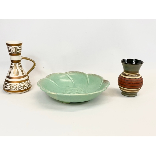 476 - 3 pieces of German pottery. A jug, a vase and a large bowl. Bowl measures 30cm. Jug measures 21.5cm