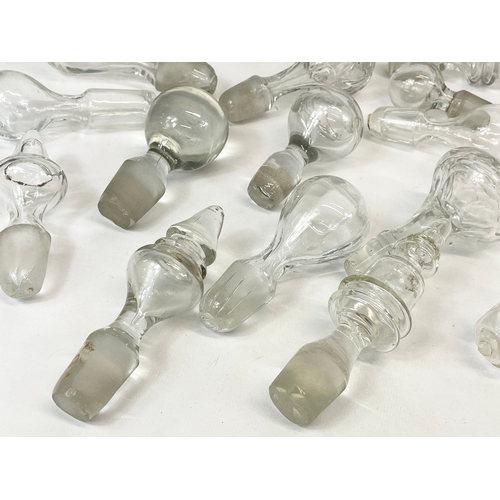 477 - A quantity of Georgian, Victorian and Edwardian glass decanters tops.