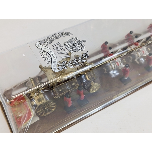 69 - An unopened model of the Royal State Coach, The Queen's Silver Jubilee 1977. 38x10cm