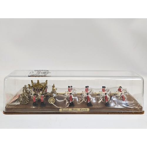 69 - An unopened model of the Royal State Coach, The Queen's Silver Jubilee 1977. 38x10cm